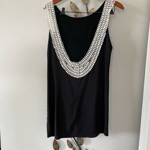 The Hanger - black tunic top, low back with contrast detail - Size S